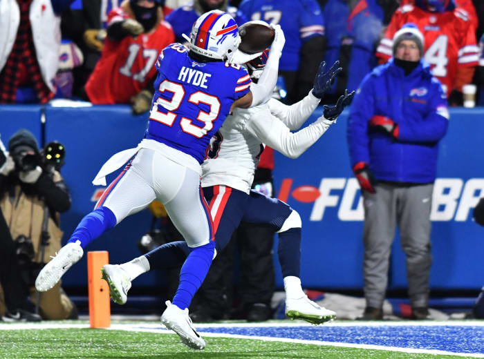 Micah Hyde intercepts a pass during a 2021 AFC Wildcard game